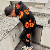 DERMEARNE DENIM TEARS 2025 New Men's and Women's Same Kapok Foam Printing High Street Fleece Hooded Sweater with Trousers Set