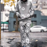 DERMEARNE DENIM TEARS 2025 New Men's and Women's Same Kapok Foam Printing High Street Fleece Hooded Sweater with Trousers Set