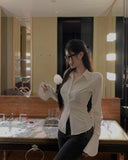 Spring And Summer High Street Sexy Suspender Shirt Female Trumpet Sleeve Lapel Slim Female Fashion Single-Breasted Sweater 2024